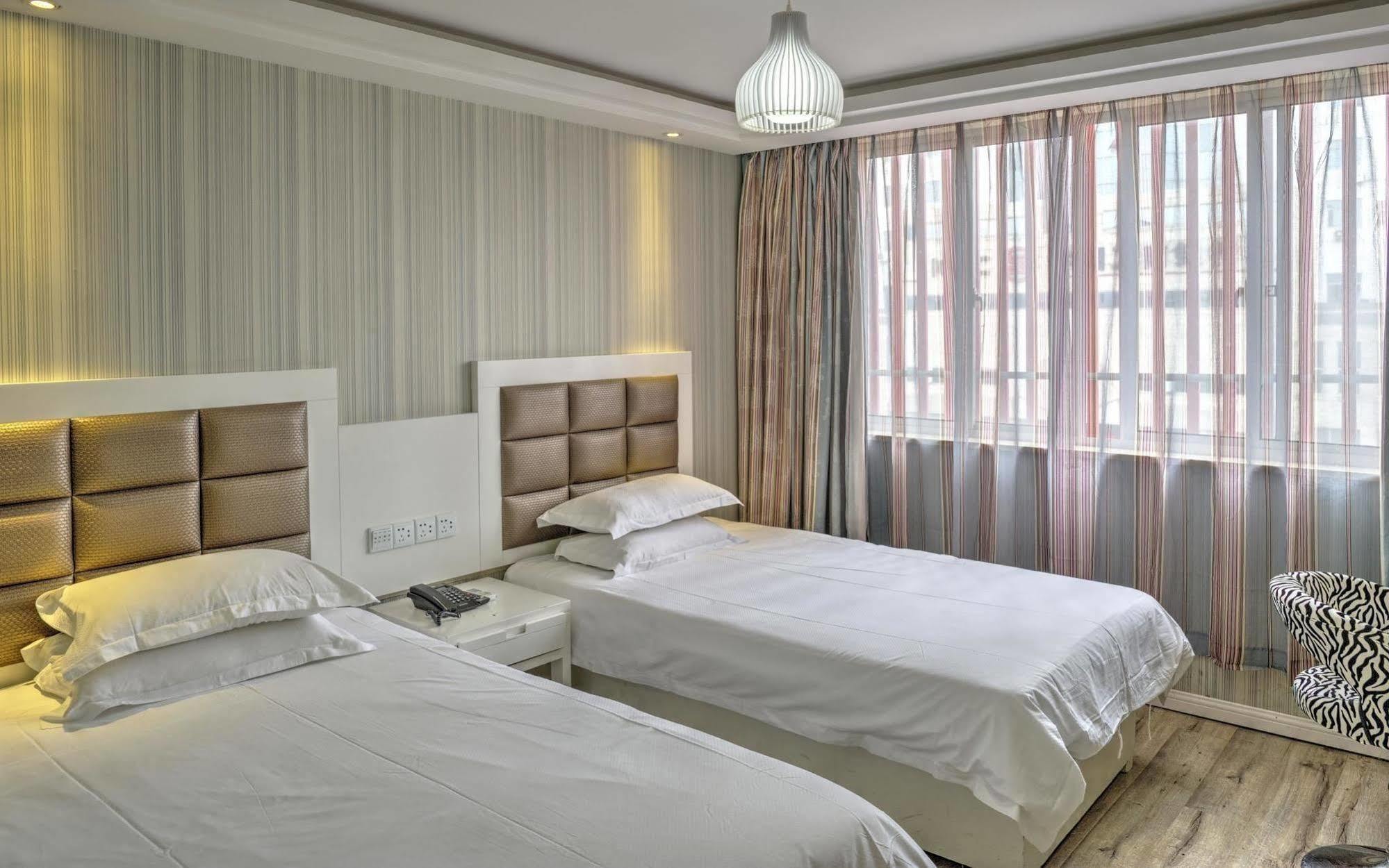 Milan Fashion Hotel Deqing Exterior photo
