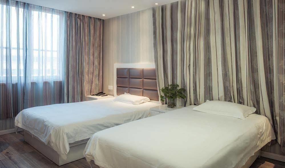 Milan Fashion Hotel Deqing Exterior photo